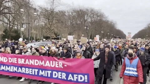 Berlin: Protest march against AfD and for preservation of political firewall, 4K Stock Footage 300789876