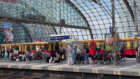 Berlin: Rapid transit railway (S-Bahn) departs Berlin Central Train Station, 4K Stock Footage 276711413