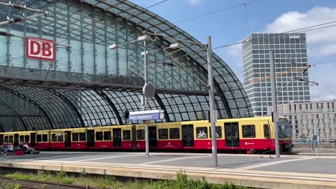 Berlin: Rapid transit railway (S-Bahn) departs Berlin Central Train Station, 4K Stock Footage 276711415