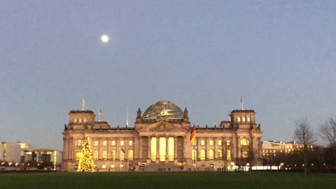 Berlin: Reichstag building at dusk which houses the German parliament, 4K Stock Footage 167035938