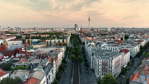 Berlin skyline with famous TV tower and dramatic cloudscape at the sunrise Stockbeeldmateriaal 237522018