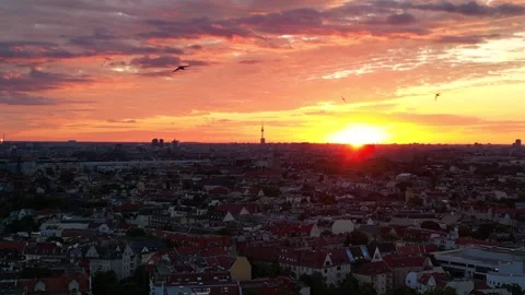 Berlin skyline shining during orange sunset. Smooth aerial view flight drone Stock Footage 281290696