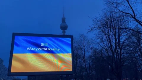 Berlin: Solidarity with Ukraine display on info screen at Alexanderplatz, 4K Stock Footage 234045877