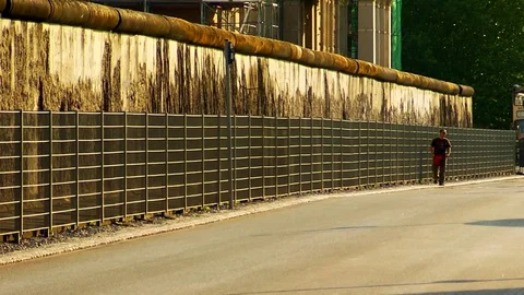 Berlin Wall pan along Stock Footage 75787425