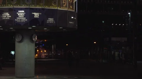 BERLIN, World clock and Alexanderplatz in night with tram and tourists. Stock Footage 78578804