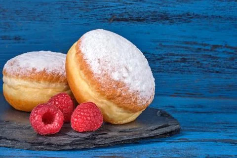 Berliner jelly filled doughnut with raspberry and redcurrant. Foto stock