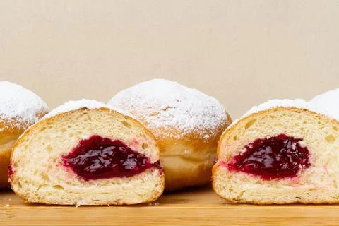 Berliners (German donuts) with raspberry jam Stock-Fotos