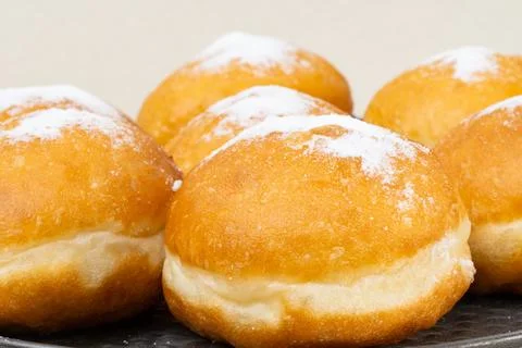 Berliners (German donuts) with raspberry jam Foto stock