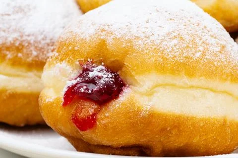 Berliners (German donuts) with raspberry jam Stock-Fotos
