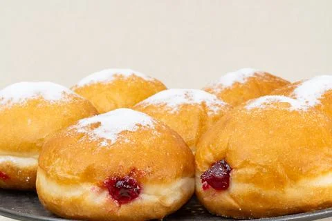 Berliners (German donuts) with raspberry jam Foto stock