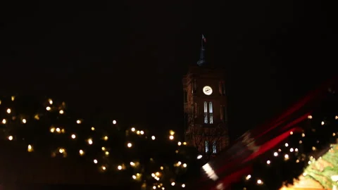 In Berlin's Mitte district, Red Town Hall Rotes Rathaus lights up during Stock Footage 214478033