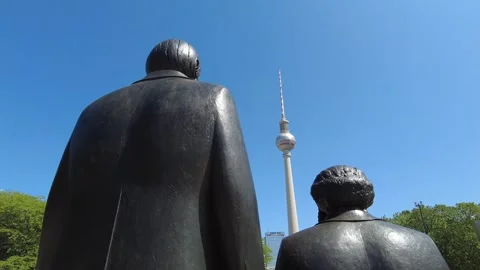Berlin's Television Tower behind a statue Stock Footage 282190176