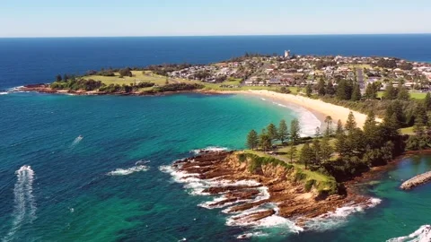 Bermagui harbour in town at river delta with break wall – aerial panning 4k. Stock Footage 183122473