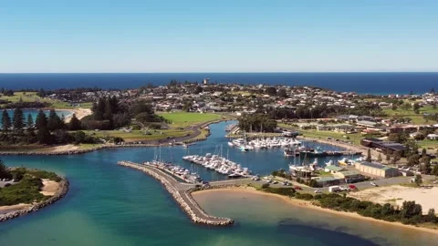 Bermagui town, river and harbour in aerial panning on Sapphire coast as 4k. Stock Footage 183106939