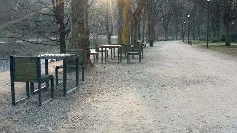Bernardine park with empty benches in the Spring morning.  Vilnius, Lithuania Stock Footage 155580801