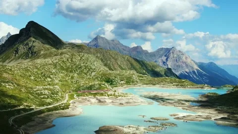 Bernina Express red swiss train Swiss Alps. Rhaetian Railway famous Lake Bianco Stock Footage 223022269