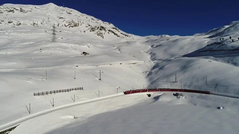 Bernina Express, red train of Bernina. Unesco. Aerial view with drone. Vidéo 83443394