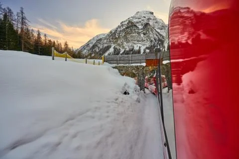 The Bernina Express Red Train through the Alps Stock Photos