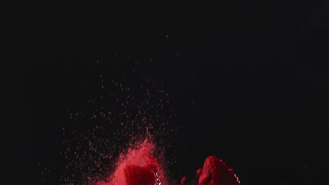 Berries and red powder exploding in the air Stock Footage 142957845