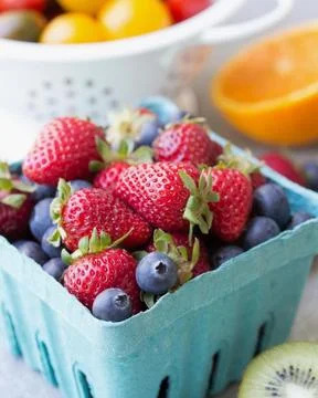 Berries in a basket Stock Photos