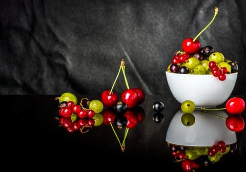 Berries on black Stock Photos