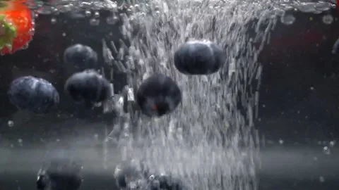 Berries with bubbles in water Stock Footage 140899528