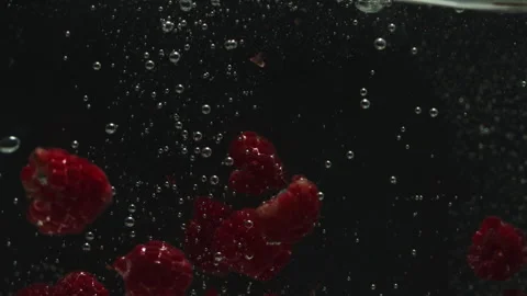 Berries falling in water slow motion Stock Footage 245505197
