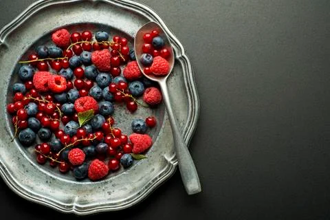 Berries fruit with spoon Stock Photos