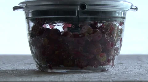 Berries grind in a blender Video stock 54408874