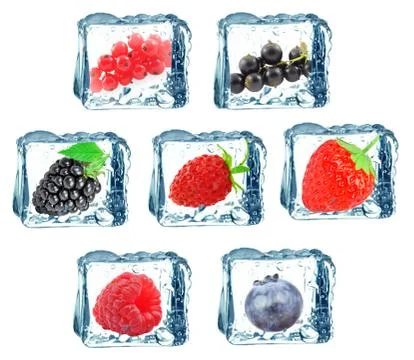 Berries in ice cube Stock Photos