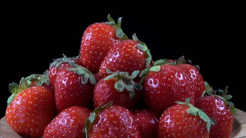 Berries in strawberries on a plate Stock Footage 155162649