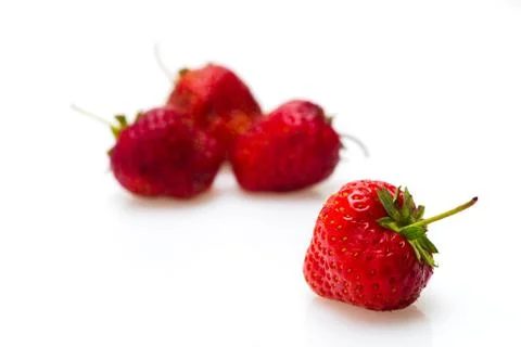 Berries of a strawberry on a white background Stock Photos