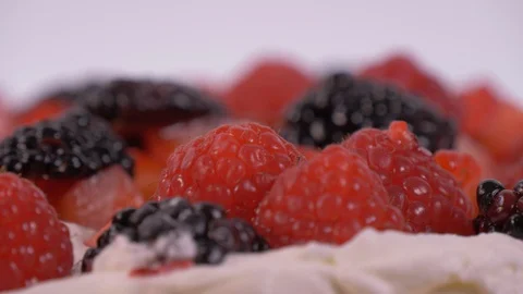 Berries on top of a Cake that is rotating. Cake, Berries Stock-Footage 127934875