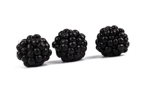 Berry berries, three pieces, lie at the same distance from each other, dark v Stock Photos