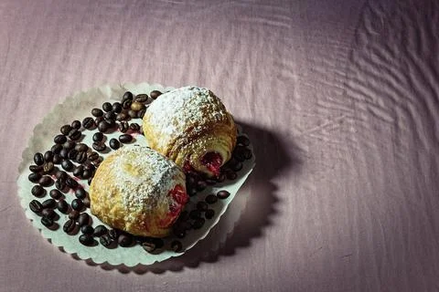 Berry buns on a light background. Stock Photos