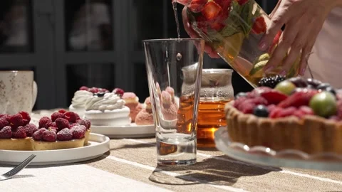 Berry desserts on the table in plates and lemonade Stock Footage 314023055