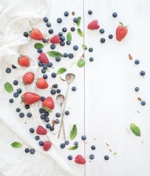 Berry frame with copy space on right. Strawberries, raspberries, blueberries  Stock Photos