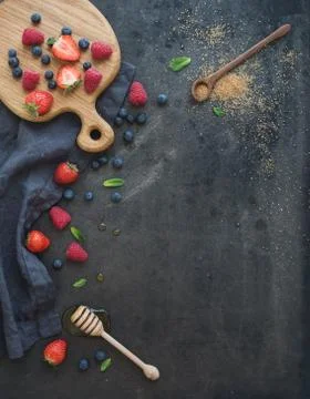 Berry frame with copy space on right. Strawberries, raspberries, blueberries  Stock Photos