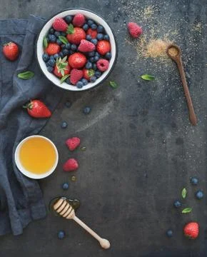 Berry frame with copy space on right. Strawberries, raspberries, blueberries  Stock Photos