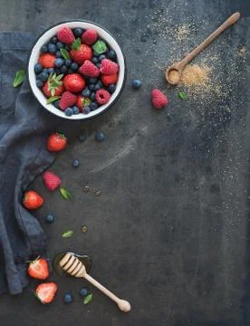 Berry frame with copy space on right. Strawberries, raspberries, blueberries  Stock Photos