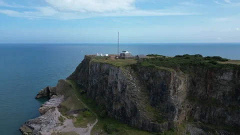 Berry Head, South Devon, England: DRONE VIEWS: Berry Head headland and quarry Stock Footage 244385589