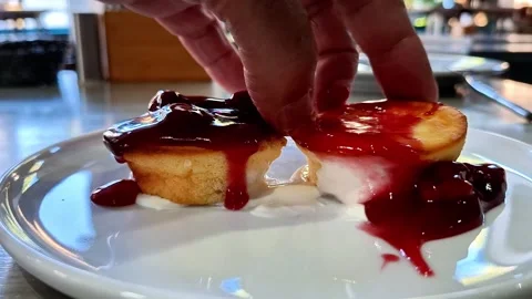 Berry Jam Dripping Over Fresh Pastry on White Plate Close Up Stock Footage 339134100