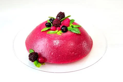 A berry jelly mousse cake with blackberries, raspberries, currants, mint Stock Photos