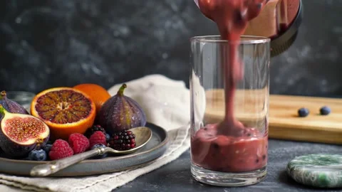 Berry Noir  Elegant Dark Kitchen Smoothie Pour with Fresh Fruits Stock Footage 307433447