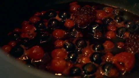 Berry Sauce boiling in a pan Stock Footage 101284252