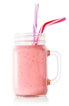 Berry smoothie or yogurt in mason jar with straws Stock Photos