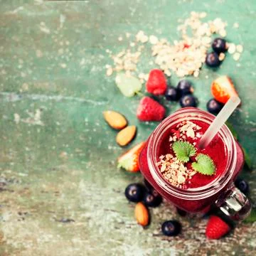 Berry smoothie on rustic background Stock Photos