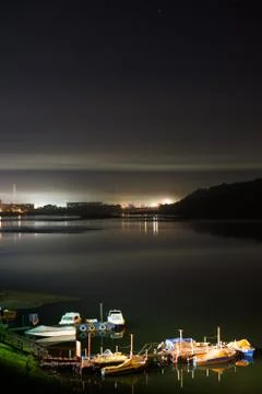 Berth with boats in night Stock Photos