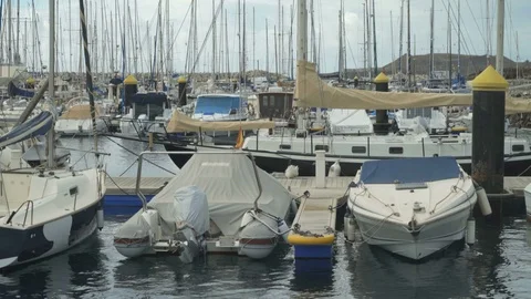 Berth sporting boats in the seaport Видео 71085589