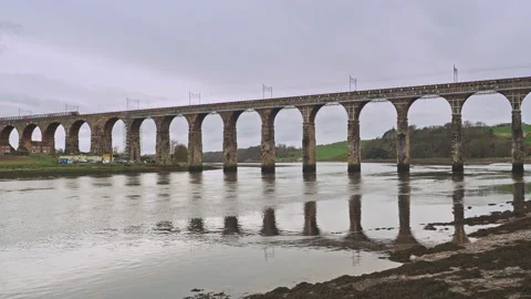 Berwick upon Tweed, train crossing Royal Border Railway Bridge over River Tweed Stock-Footage 237170917